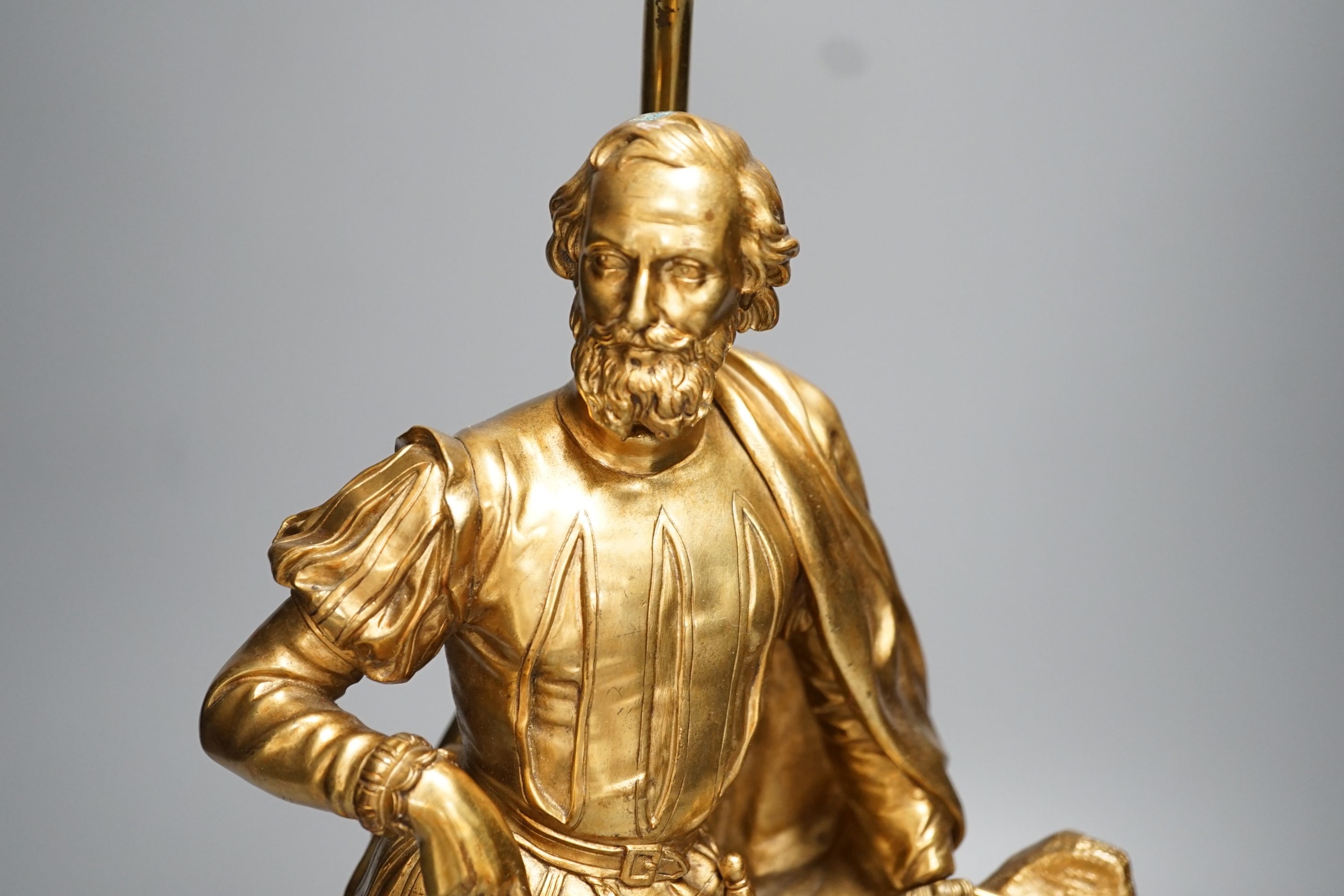 An ormolu figural lamp base depicting Luis de Camões - 51cm high